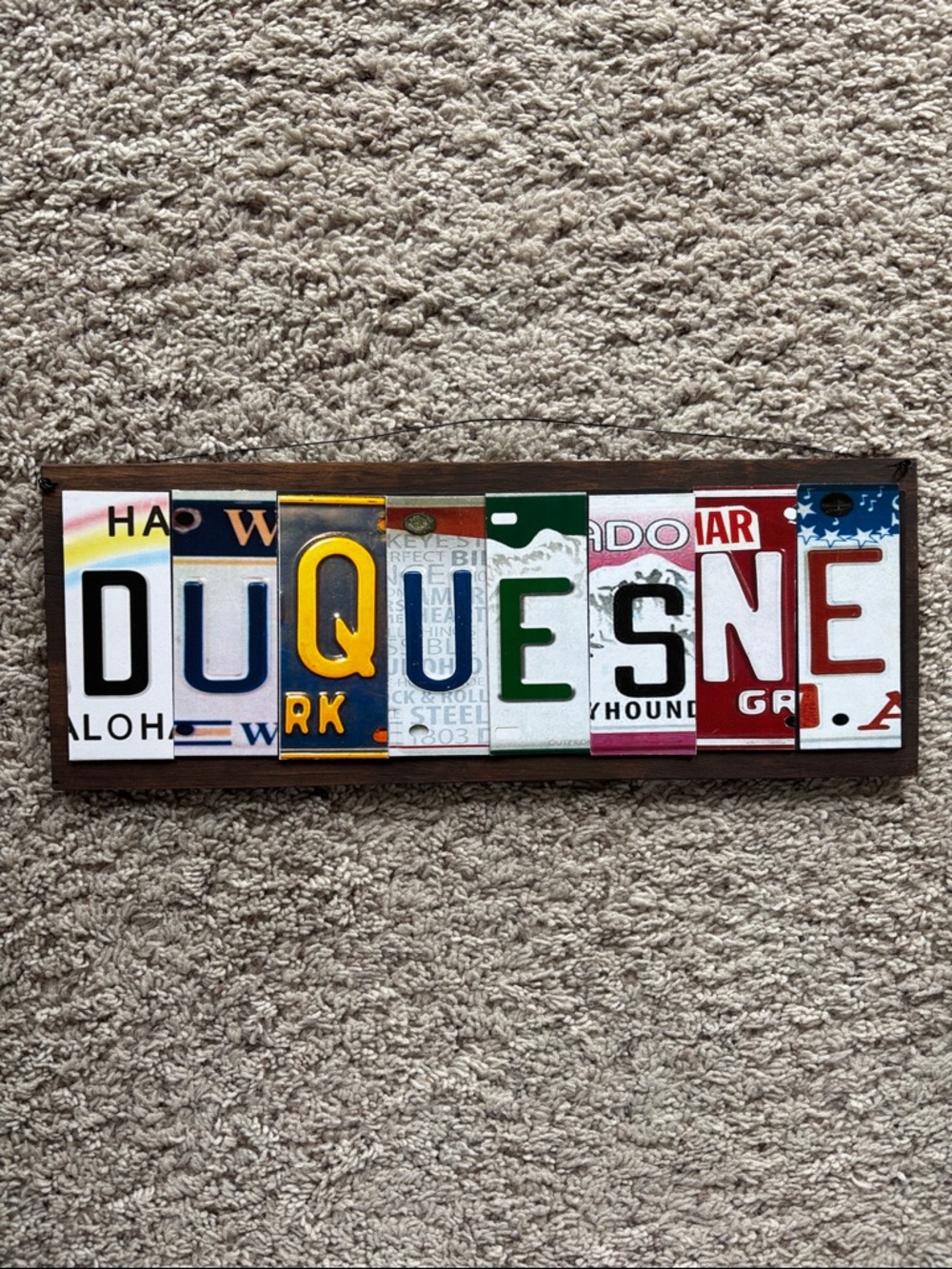 Duquense magnetic sign